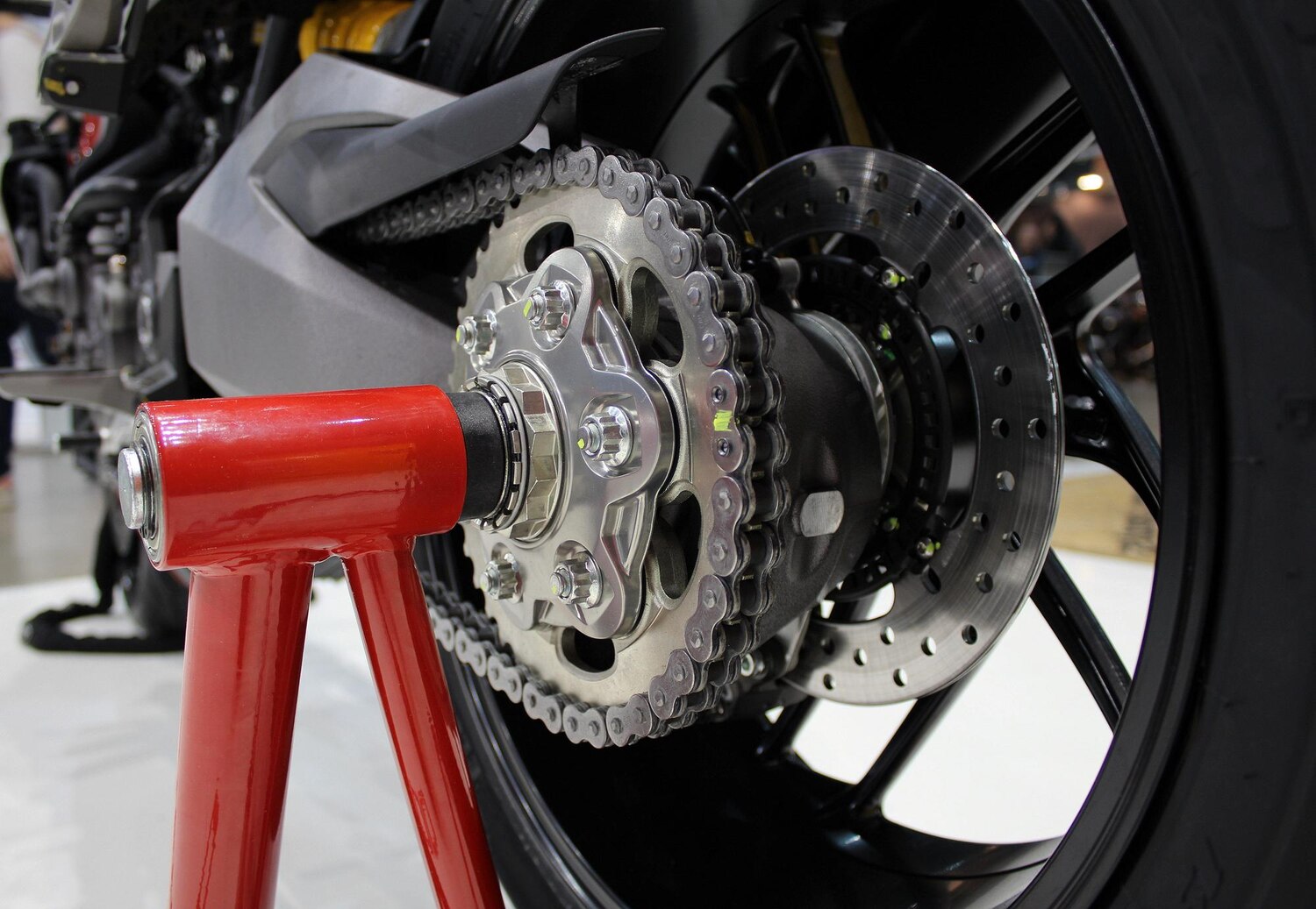 Paddock Stand Motorcycle With Chain Sprockets Closeup 519304 125 Paddock Stand Motorcycle With Chain Sprockets Closeup 519304 125