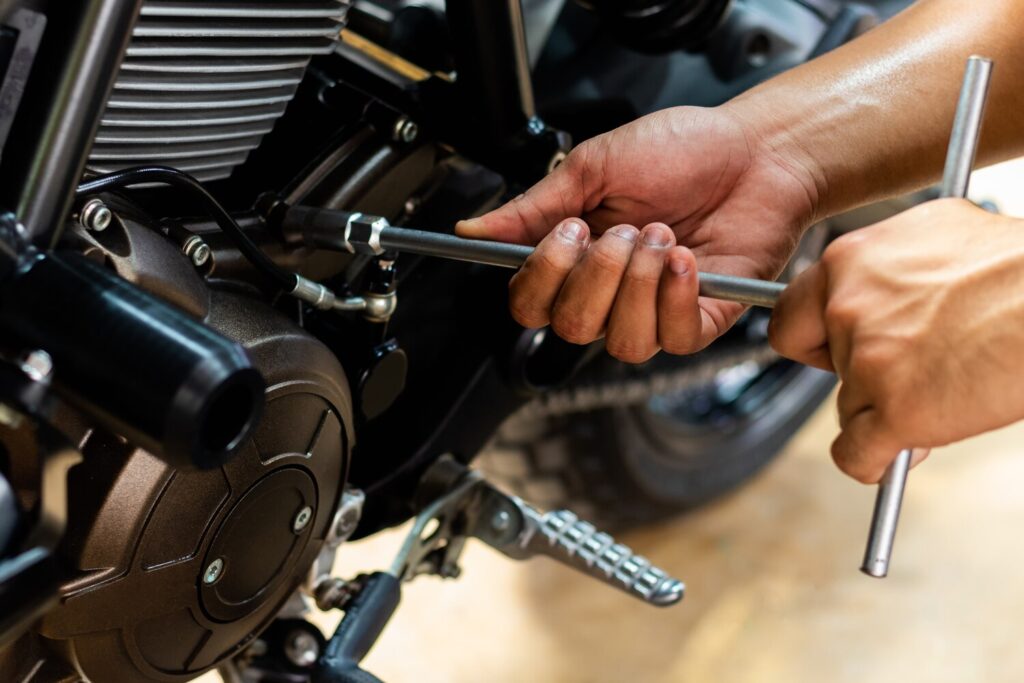 Image Is Close Up People Are Repairing Motorcycle Use Wrench Screwdriver Work 39733 575 Image Is Close Up People Are Repairing Motorcycle Use Wrench Screwdriver Work 39733 575