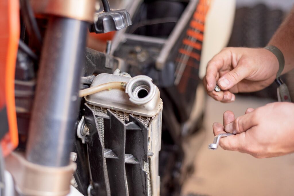 Motorbike Mechanic Replacing Cooling Radiator Replacement Radiator Maintenance 56854 2467 Motorbike Mechanic Replacing Cooling Radiator Replacement Radiator Maintenance 56854 2467