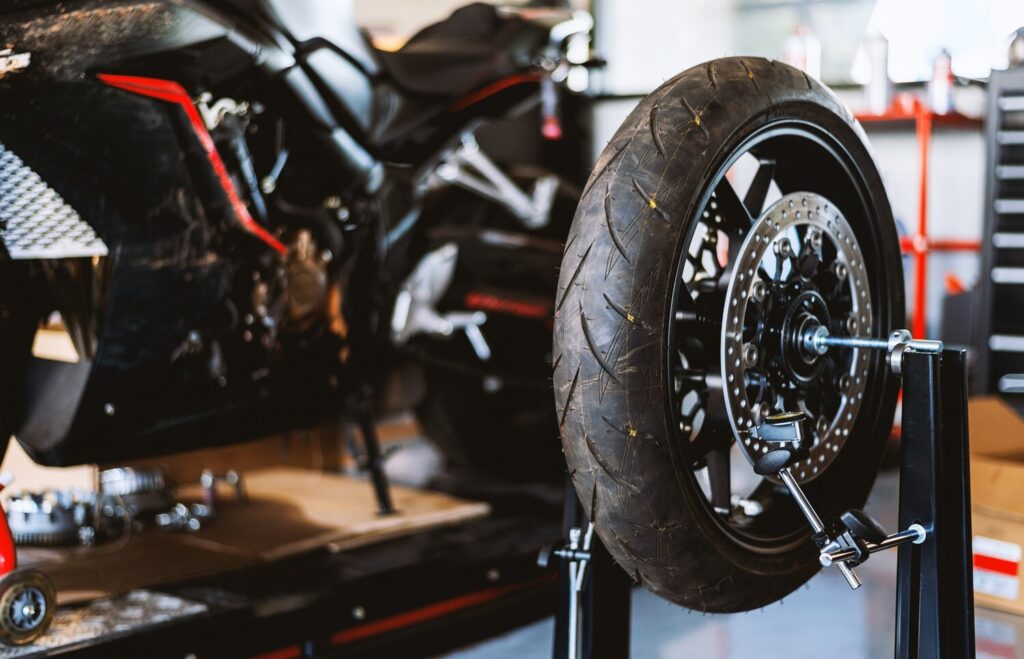 Motorcycle Repair Closeup Wheel Balancing Machine Tyre Service Center 41050 2245 Motorcycle Repair Closeup Wheel Balancing Machine Tyre Service Center 41050 2245